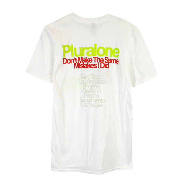 image of the back of a white tee shirt on a white background. tee says pluralone don't make the same mistakes as i did at the top, and the tour dates of leg one below.