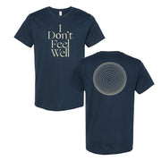 image of the front and back of a midnight navy tee shirt on a white background. front of the tee is on the right and has a center print of cream colored stacked text that says I don't feel well. the back of the tee is on the right and has a circle in the center