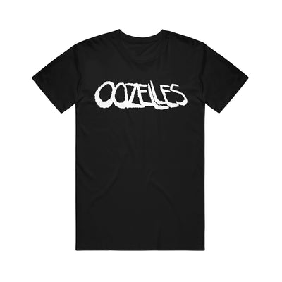 image of a black tee shirt on a white background. tee has white print across the chest that says OOZELLES