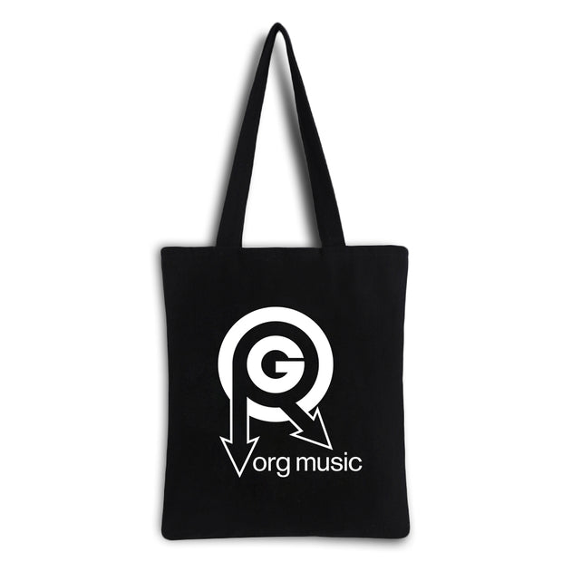 image of a black tote bag on a white backgrond. front of tote has white print of the org music logo and also says org music at the bottom