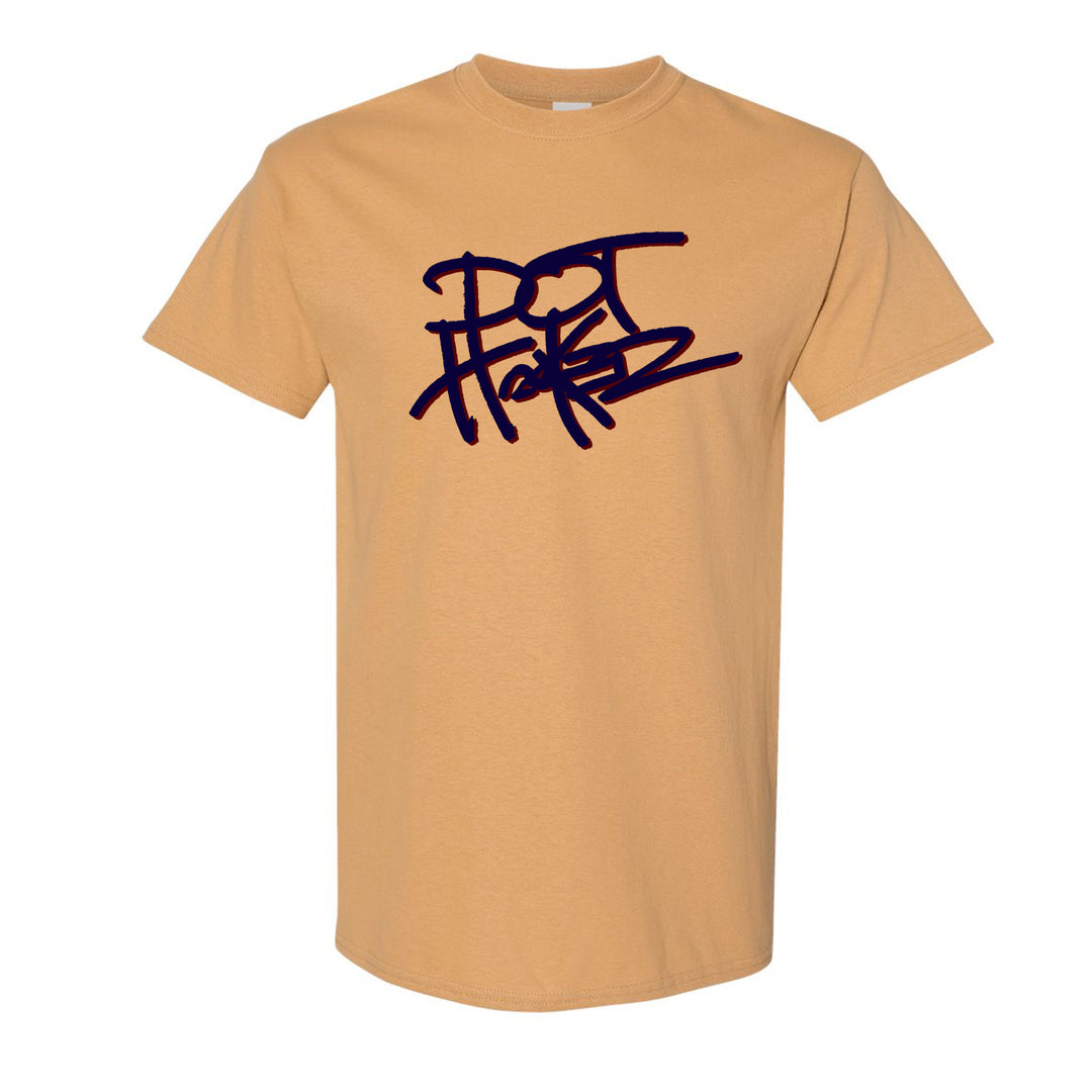 image of an old gold tee shirt on a white background. tee has center print in navy blue that says dot hacker