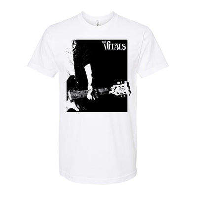 image of a white tee shirt on a white background. tee has center print in black of a man playing a guitar and also says the vitals at the top