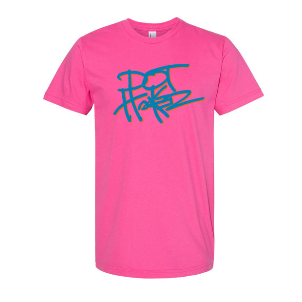 image of a pink tee shirt on a white background. tee has center print in blue that says dot hacker