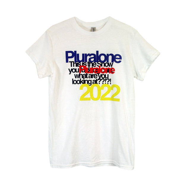 image of the front of a white tee shirt on a white background. the tee has a full center chest print that says at the top pluralone. this is the show what are you looking at? with 2022 below